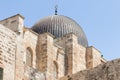 Part of the wall of the temple mountain and the dome of the Al Aqsa Mosque near the Dung Gate in the Old City in Jerusalem, Israel Royalty Free Stock Photo