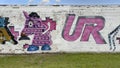 Part of the \'Wall of Toys\' production by Urban Army Crew at Trigger Fingers 2023 in Deep Ellum.