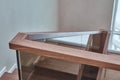 Part of wooden steps with glass railings. Walnut staircase Royalty Free Stock Photo