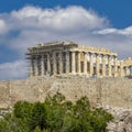 Athens Greece, Parthenon temple on Acropolis hill under slight coludy sky. Royalty Free Stock Photo