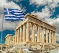 Parthenon athens greeece and greek flag waving Royalty Free Stock Photo