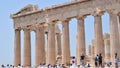 Parthenon front side with tourist