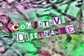 Partial blurred cut out colored letters from magazines and compilation of cognitive dissonance Royalty Free Stock Photo
