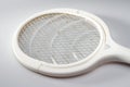 Partial Closeup Of A White Electric Mosquito Swatter