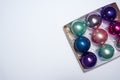 Partial image of cardboard box with Xmas balls Royalty Free Stock Photo