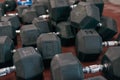 Partial image of set of variety weight dumbbells