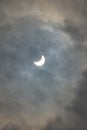 Partial solar eclipse on a cloudy day Royalty Free Stock Photo