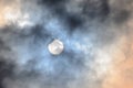 Partial Solar Eclipse in Cloudy sky Royalty Free Stock Photo