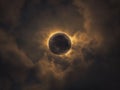 Partial solar eclipse in cloudy sky Royalty Free Stock Photo