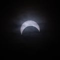 Partial Solar Eclipse Through Thin Clouds Royalty Free Stock Photo