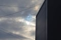 Partial solar eclipse viewed under cloudy skies Royalty Free Stock Photo