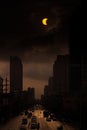 Partial and total solar eclipse over building in Bangkok city, Thailand, Asia Royalty Free Stock Photo