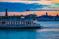 Partial view of Disney Ferry and Grand Floridian Resort & Spa on beautiful sunset background at Walt Disney World  area 1 Royalty Free Stock Photo