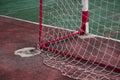 Partial view of the empty goal of a street soccer field