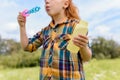partial view of kid blowing soap bubbles Royalty Free Stock Photo