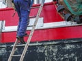 Ladder on the hull in the dry dock Royalty Free Stock Photo