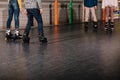 Partial view of preteen roller skaters