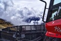 Partial view of a snowplow with blade for snow in front of the mountains of the Austrian Alps