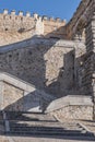 Partial view stairs attached to the aqueduct leading to the wall