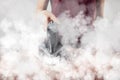 Partial view of young woman ironing Royalty Free Stock Photo