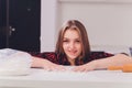 Partial view of young woman in lingerie preparing dough in kitchen. Royalty Free Stock Photo