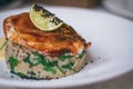 Partially blurred plate with quinoa platter, sauce, pike perch, lime Royalty Free Stock Photo