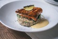 Partially blurred plate with quinoa platter, sauce, pike perch, lime Royalty Free Stock Photo
