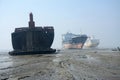 partially broken down ocean ships at a shipbreaking yard. Inside of ship breaking yard