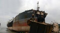 partially broken down ocean ships at a shipbreaking yard. Inside of ship breaking yard