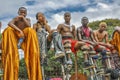 Partially clad Moko Jumbies or stilt walkers wait their turn to enter competition at the Queen`s Park Savannah in Port-of-Spain