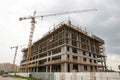 Under construction building with tower cranes Royalty Free Stock Photo
