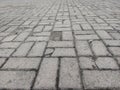 Partially damaged paving block flooring generally occurs due to use or weather factors.