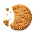 Partially eaten crunchy oat and wholemeal biscuit with crumbs isolated on white. Top view