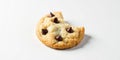 A partially eaten delicious buttery chocolate chip cookie on a plain white background. Generative AI Royalty Free Stock Photo