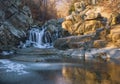 Partially frozen Scott`s Run waterfall in the morning.Scott`s Run Nature Preserve.Fairfax County.Virginia.USA