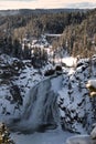 View of valley and snow covered waterfall in Yellowstone National Park Royalty Free Stock Photo