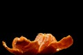 Partially peeled tangerine on a black background Royalty Free Stock Photo