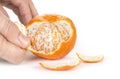 Partially peeled tangerine. Healthy food concept Royalty Free Stock Photo