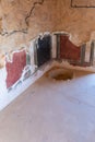 Partially  preserved painting on the inner walls of buildings on the territory of the ruins of the Massada fortress, the fortress Royalty Free Stock Photo