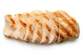 Partially sliced grilled chicken breast with grill marks, ground black pepper and salt isolated on white. Top view