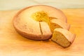 Partially sliced homemade bundt cake close-up at selective focus