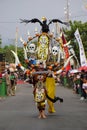 The participant Biro Fashion Carnival with a bird costume