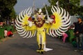 The participant Biro Fashion Carnival with a bird costume