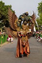 The participant Biro Fashion Carnival with dragon costume