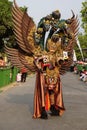 The participant Biro Fashion Carnival with dragon costume