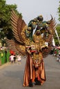 The participant Biro Fashion Carnival with dragon costume