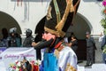 A participant in Carnival in Huejotzingo wearing traditional dress dancing.