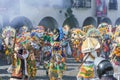 A participant in Carnival in Huejotzingo wearing traditional dress dancing.