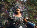 A participant in her colorful costume at a parade during the Sumaka Festival in Antipolo City.