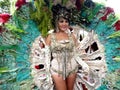 A participant in her colorful costume at a parade during the Sumaka Festival in Antipolo City.